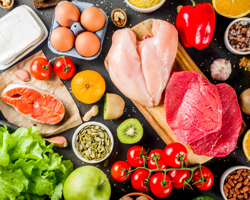 A variety of vegetables and meat on a table